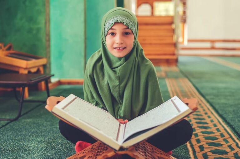 muslim-girl-reading-holy-book-quran-inside-mosque1-min